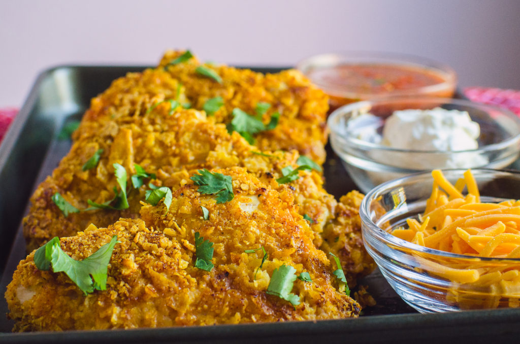 Tortilla crusted chicken on the left with topping on the right. 