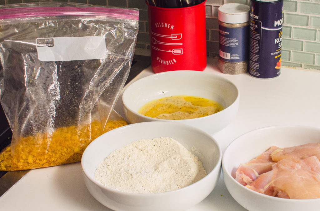 dredging chicken in flour