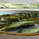 Fried sage leaves on a late.